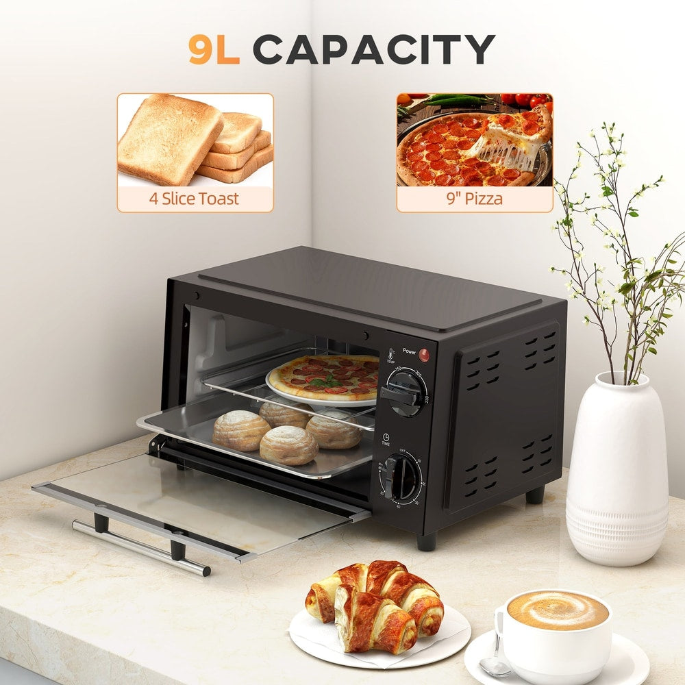 The countertop electric grill with the door open showing food on the tray and rack