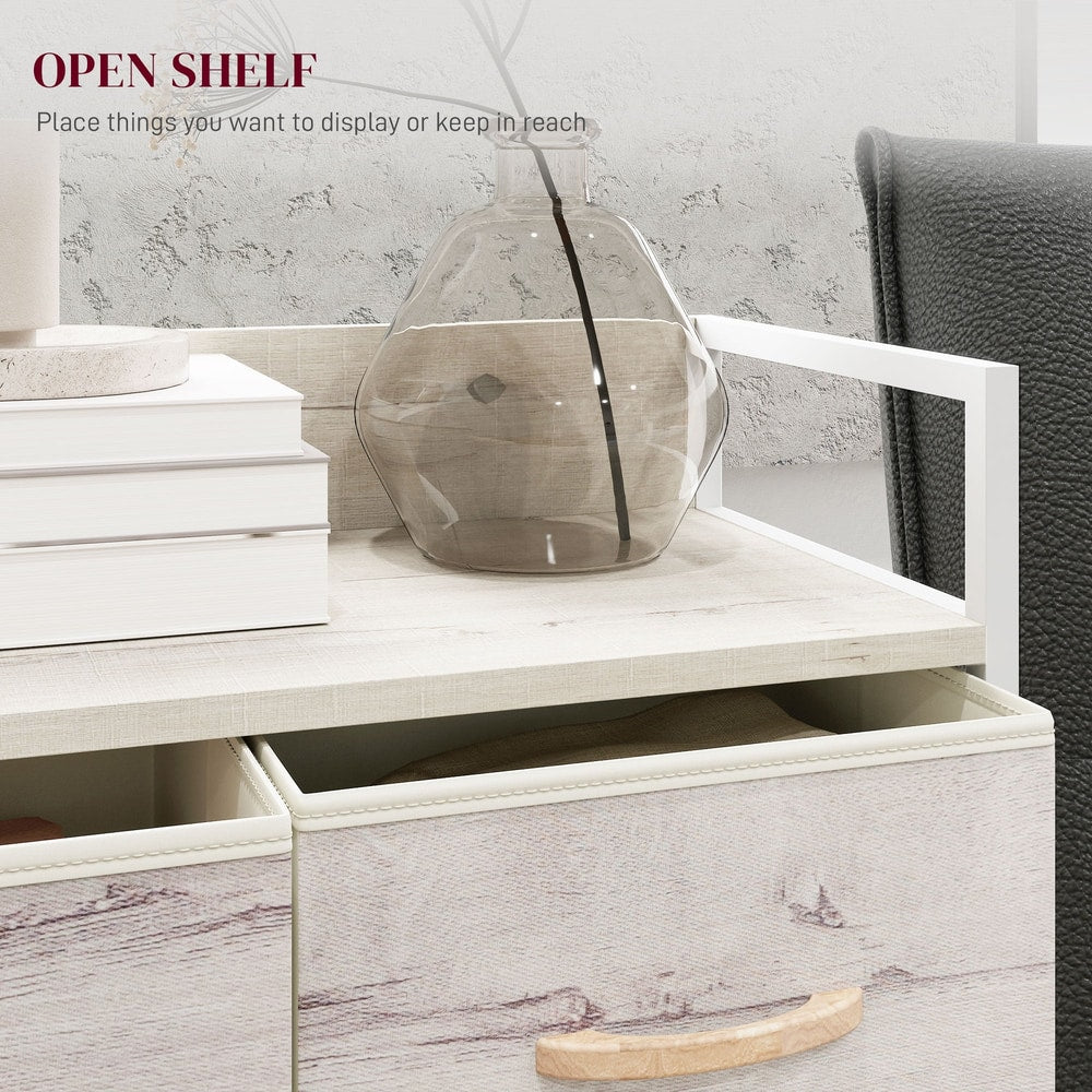 Close up of the top open shelf of the chest of drawers with decorative items