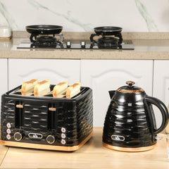 Black kettle and four-slice toaster set on a kitchen counter