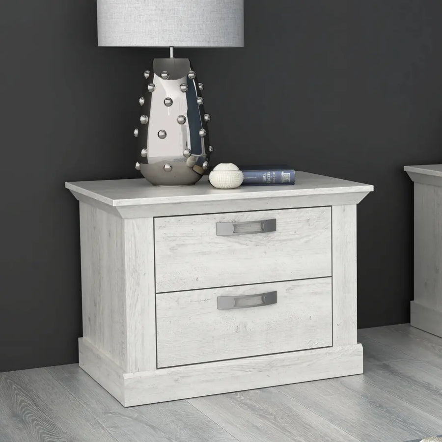 Kashmir Bedside Table 67cm [Set Of Two] shown with a lamp and book on a light wood floor