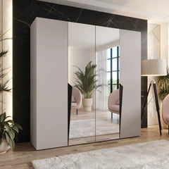 The light grey hinged wardrobe with mirrored doors in a modern room setting