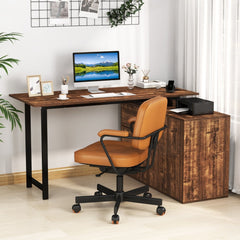 The office desk set up in a home workspace with a chair and computer monitor on the desktop