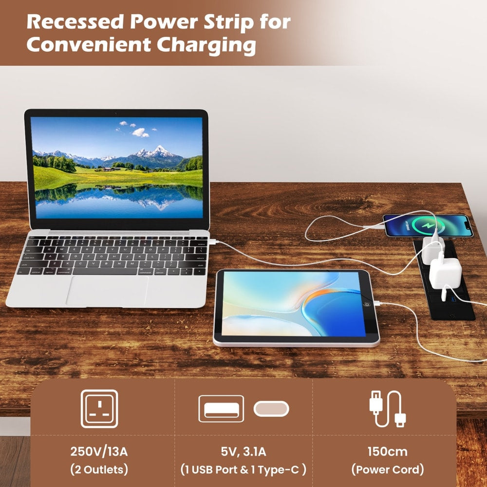 The office desk surface showing the recessed power strip with charging cables and devices