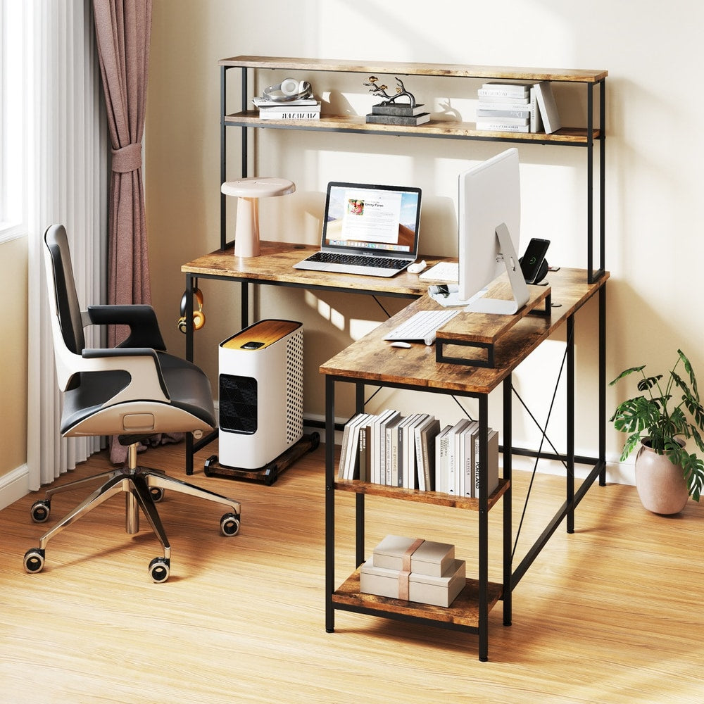 The office desk set up in a bright home study with a chair and wooden flooring