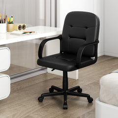 The office chair in a home office setting next to a desk with stationery