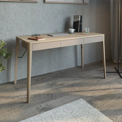 Match MK-01 Desk 139cm set up in a home office with a laptop and accessories on the surface