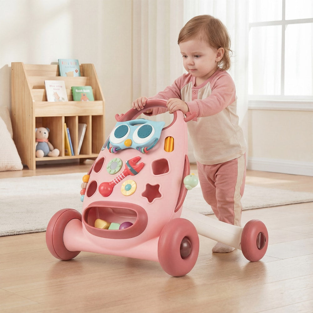 A young child pushes the pink baby walker toy across a carpeted floor