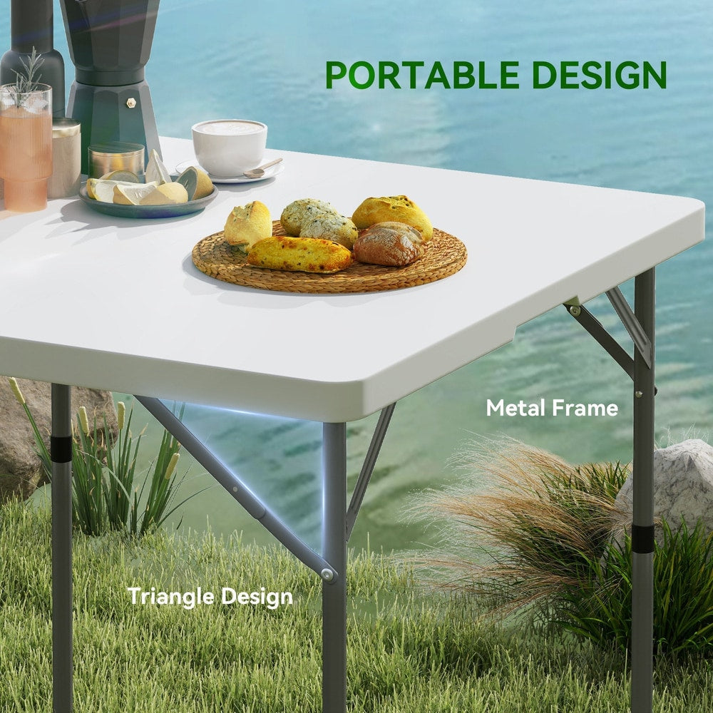 Close up of the white camping table surface and metal frame legs