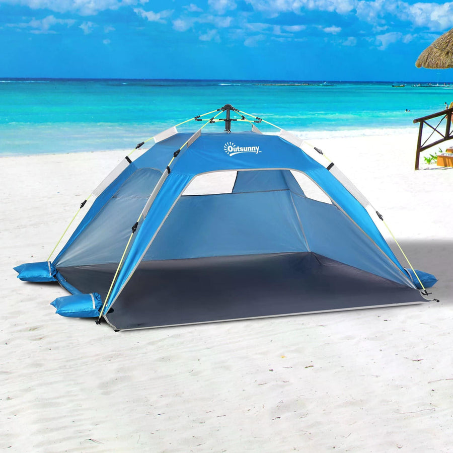 Outsunny Beach Tent for 1-2 Person Pop-up Design with 2 Mesh Windows & 2 Doors Sky Blue on a sandy beach