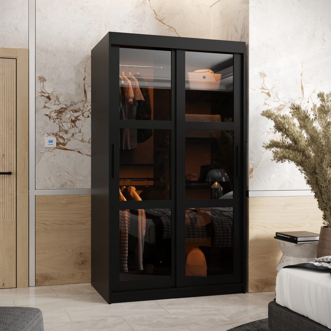 The sliding door wardrobe in black with mirrored doors and internal shelves