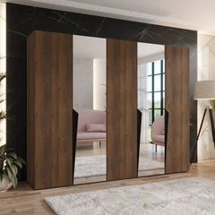 Piano II Hinged Door Wardrobe 250cm in a modern room with mirrored doors reflecting a sofa