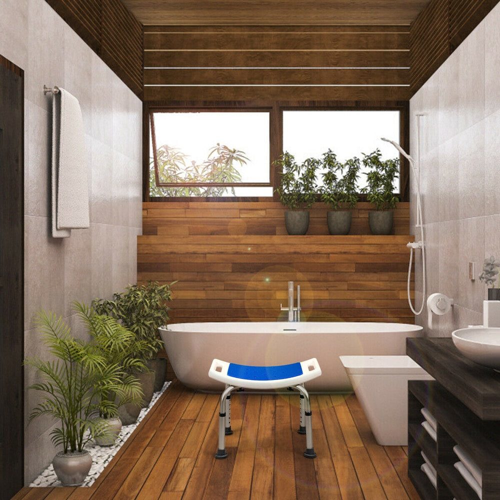 The shower stool positioned on a wooden floor in a contemporary bathroom setting