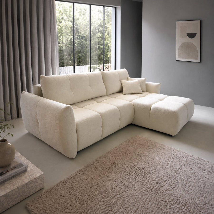 Corner Sofa Bed Base in a modern living room setting with large windows and a rug