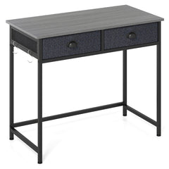 The office desk with a grey wood grain top and black metal frame on a white background