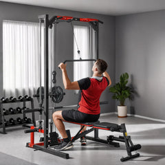 The power tower being used by a man performing a lat pull down exercise on a gym bench