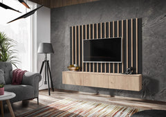 The entertainment unit in a light oak finish with a dark panel background