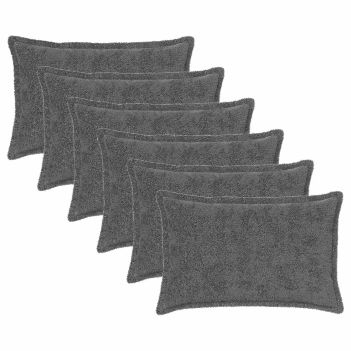 Six dark grey faux rabbit fur cushion covers arranged in a fan shape