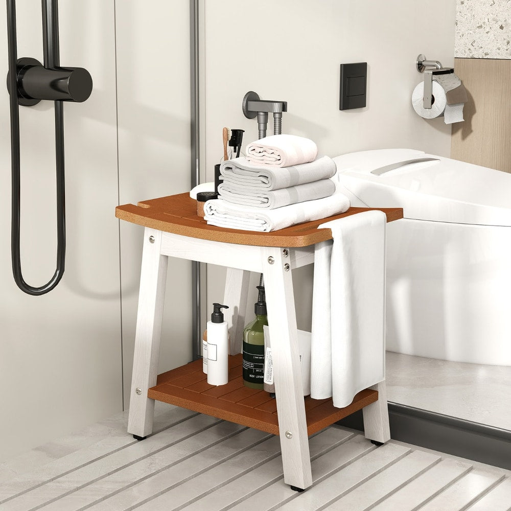 The shower stool placed in a modern bathroom with folded towels and toiletries on the shelf