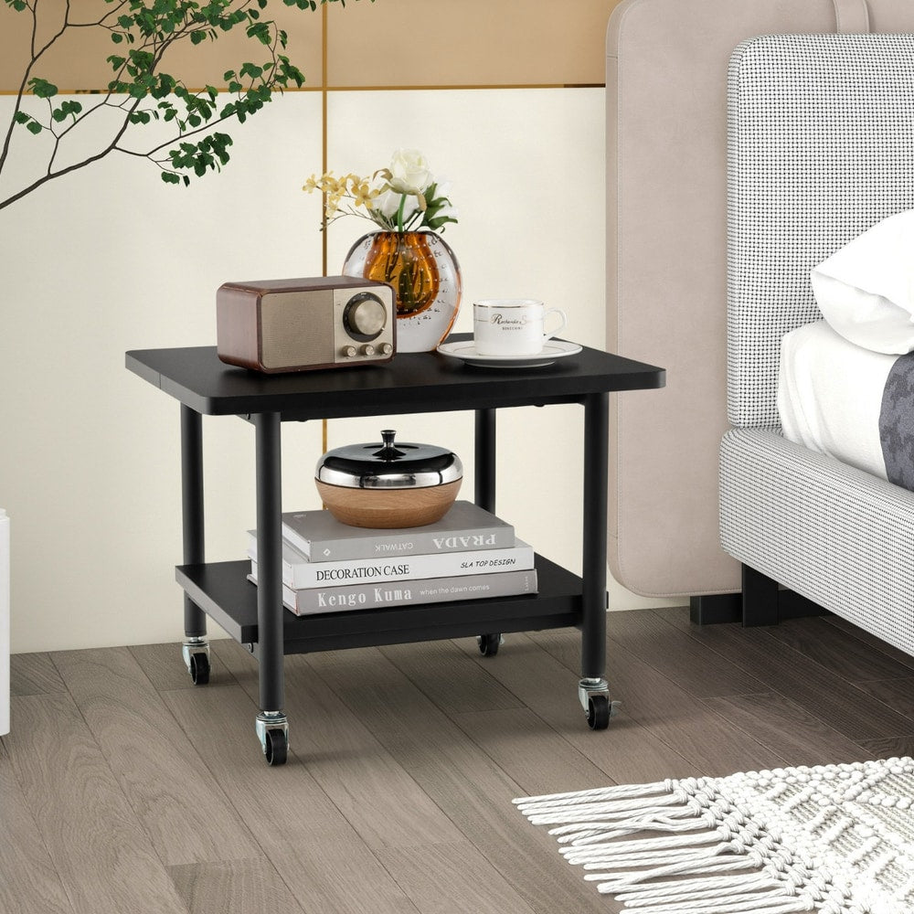 The black wooden printer stand with two tiers, shown next to a bed with a radio and books on it