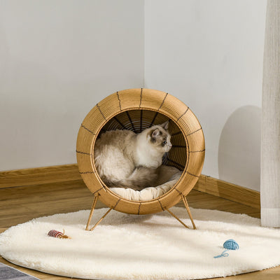 Cama elevada de mimbre para gatos PawHut, canasta elevada de ratán para gatitos, cueva acogedora con cojín suave, Φ52 x 58 cm, marrón claro