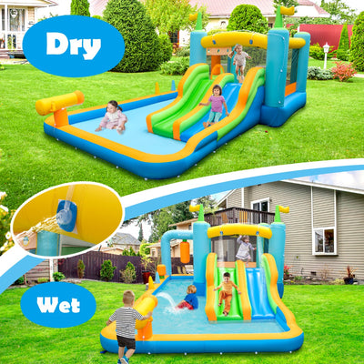 Castillo inflable con toboganes dobles para niños