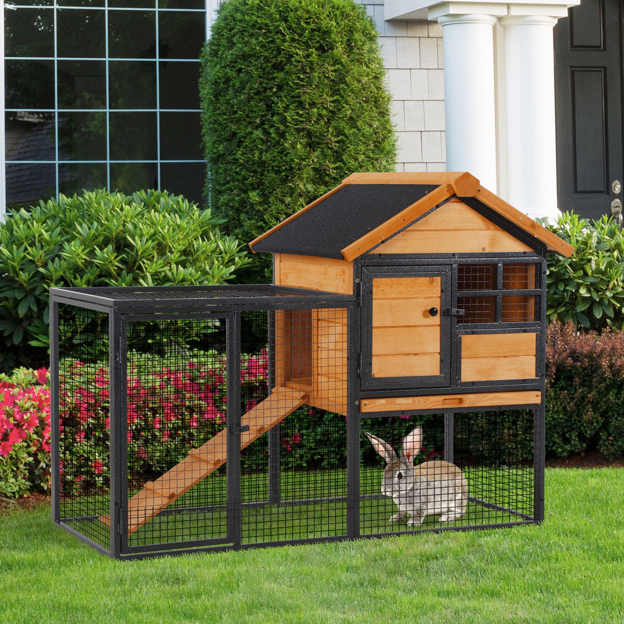 Bunny cage with pull out outlet tray